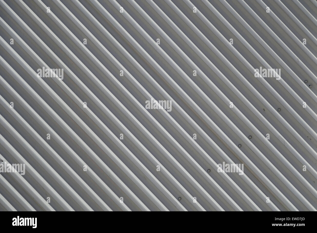 Corrugated metal cladding diagonal stripe background Stock Photo