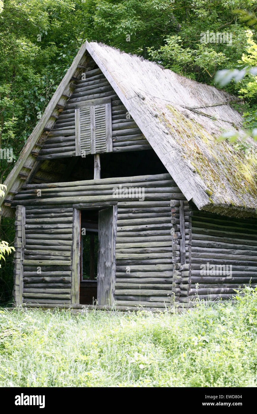 Romantic old wooden house in forest Stock Photo - Alamy