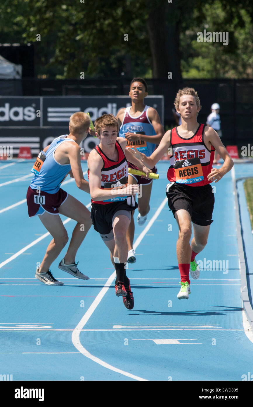 Regis High School of NYC passes the baton in the HS Boys 4X800 relay at the  2015 Adidas NYC Diamond League Grand Prix Stock Photo - Alamy