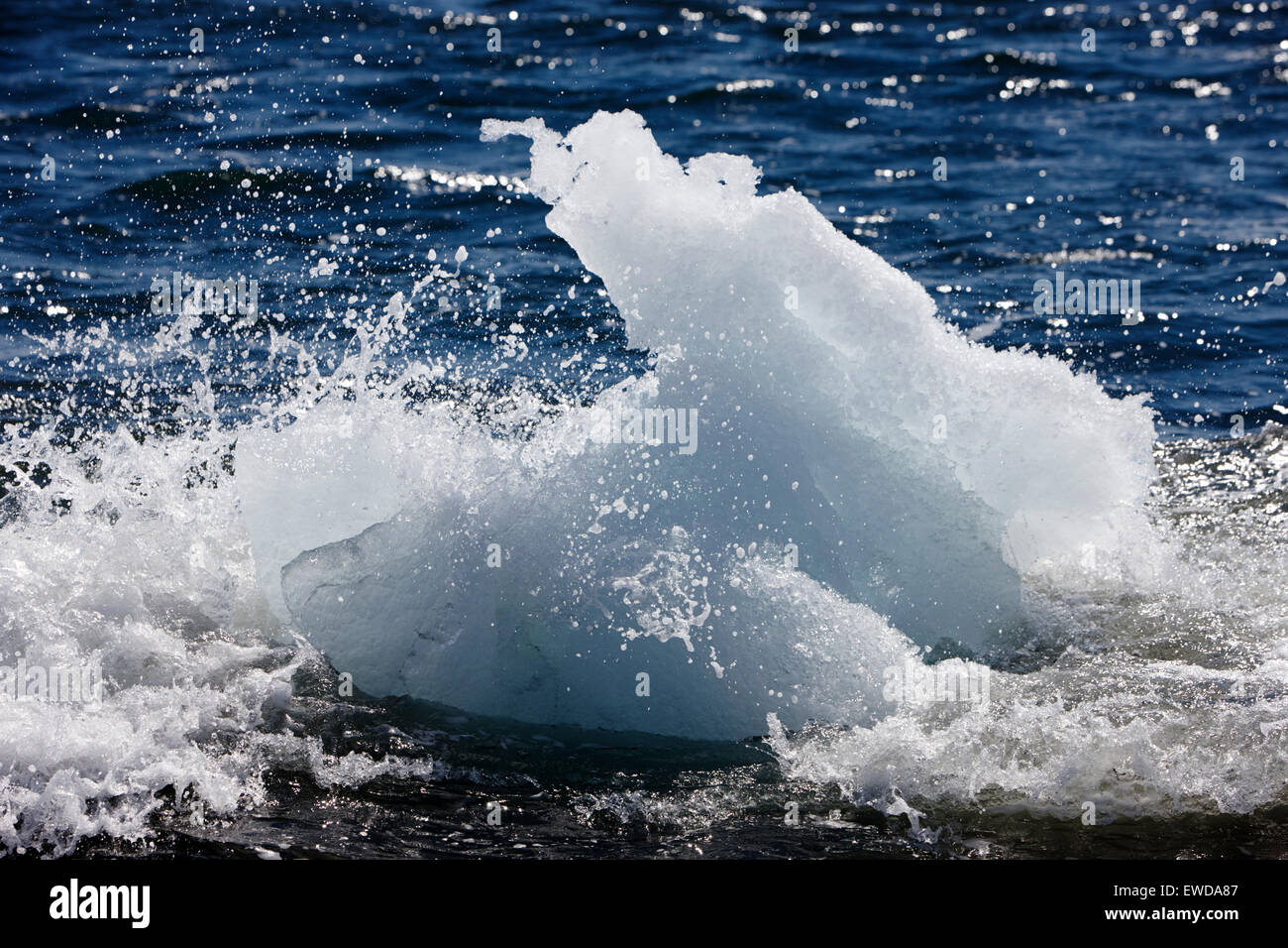 icebergs washing up on the black sand beach at Jokulsarlon Iceland Stock Photo