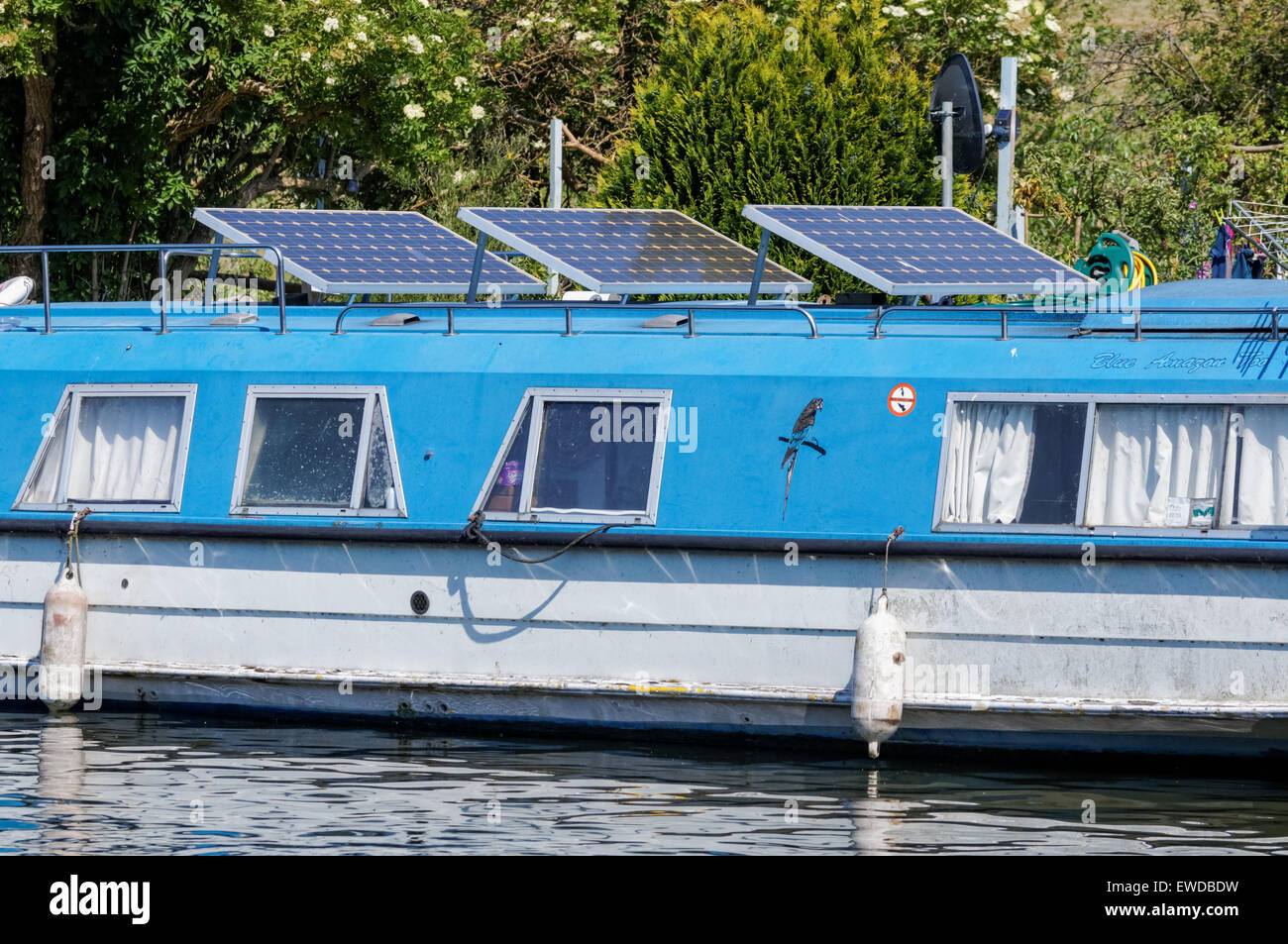 Boat with solar panels, London England United Kingdom UK Stock Photo
