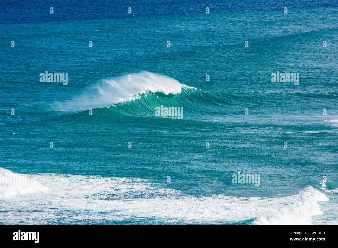 Large winter surf breaking off Hanakapiai, Na Pali Coast, Kauai, Hawaii, USA Stock Photo