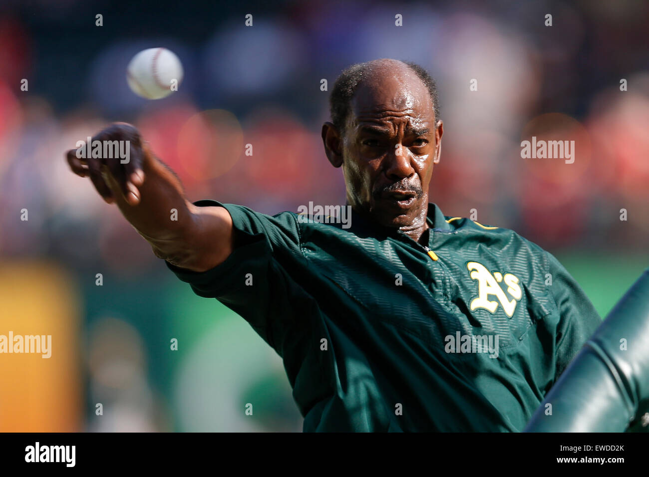 Arlington, Texas, USA. 23rd June, 2015. Oakland Athletics coach Ron Washington throws batting