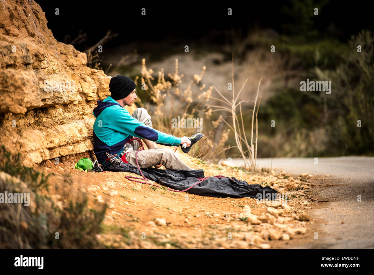 Italian climber Gabriele Moroni getting ready for climbing session in Margalef, Spain. Stock Photo