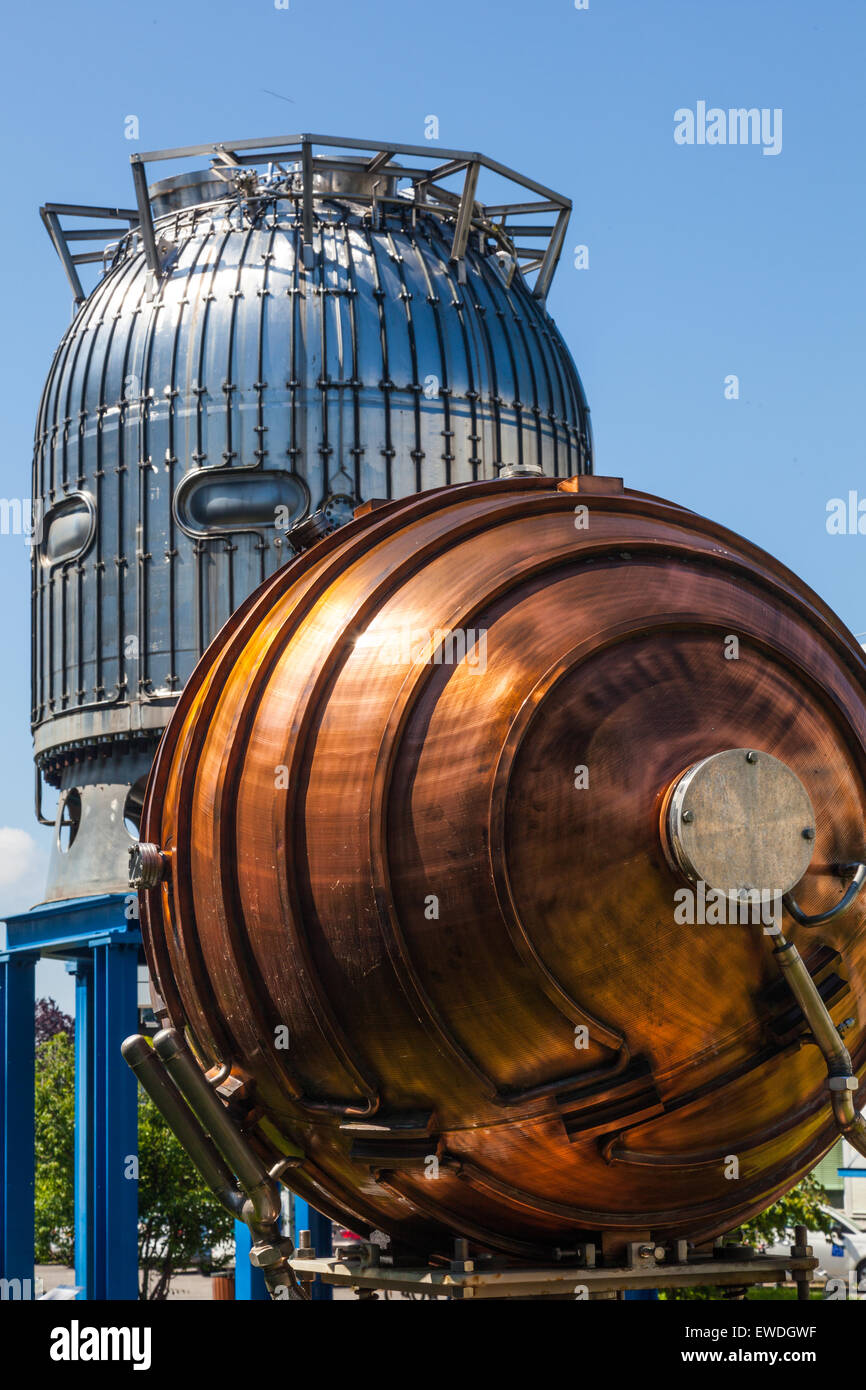 Bubble chamber and a copper RF accelerating device on display at CERN, Geneva, Switzerland Stock Photo