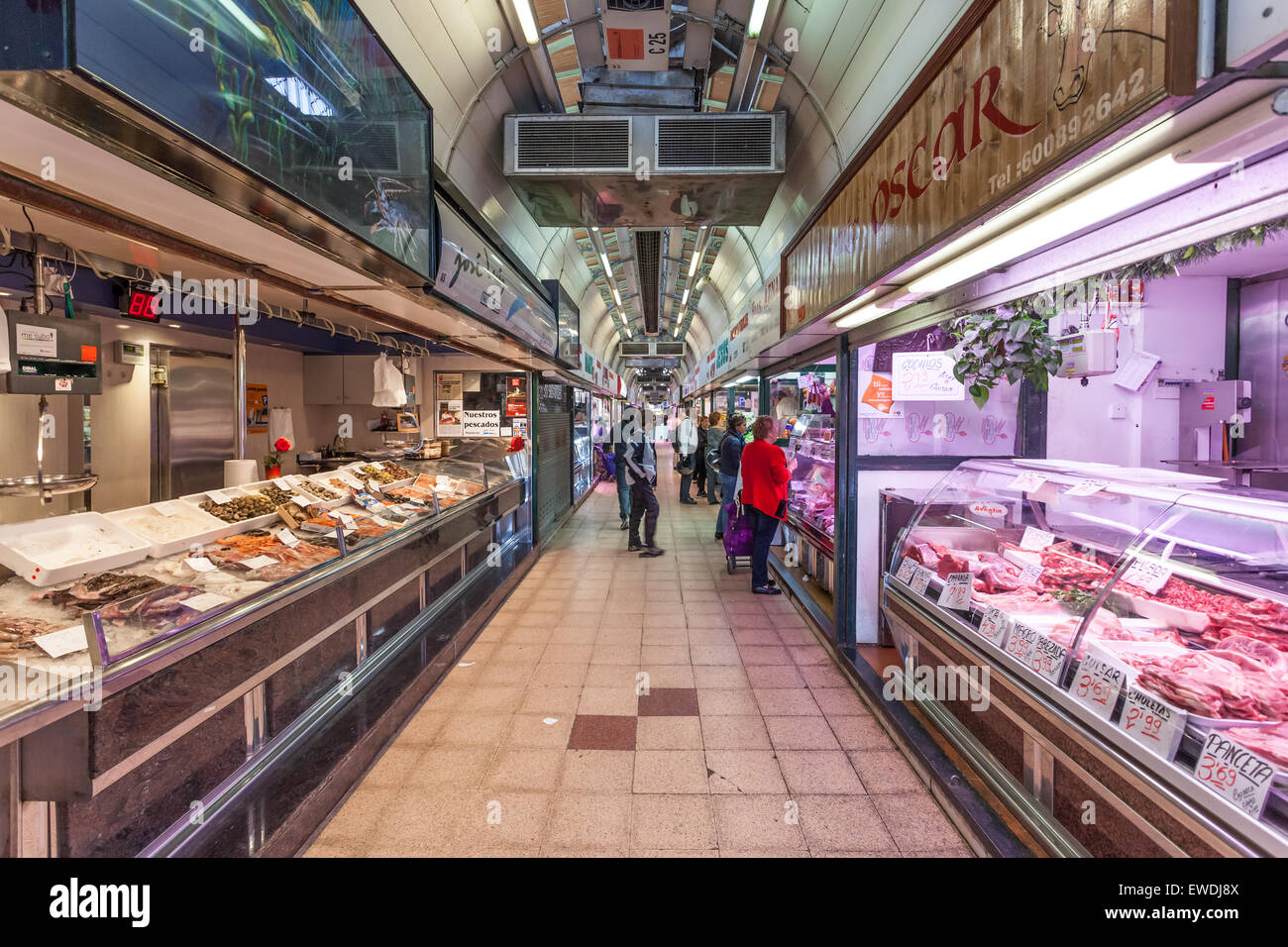 Fish and meat stands inside of the traditional market in Zaragoza