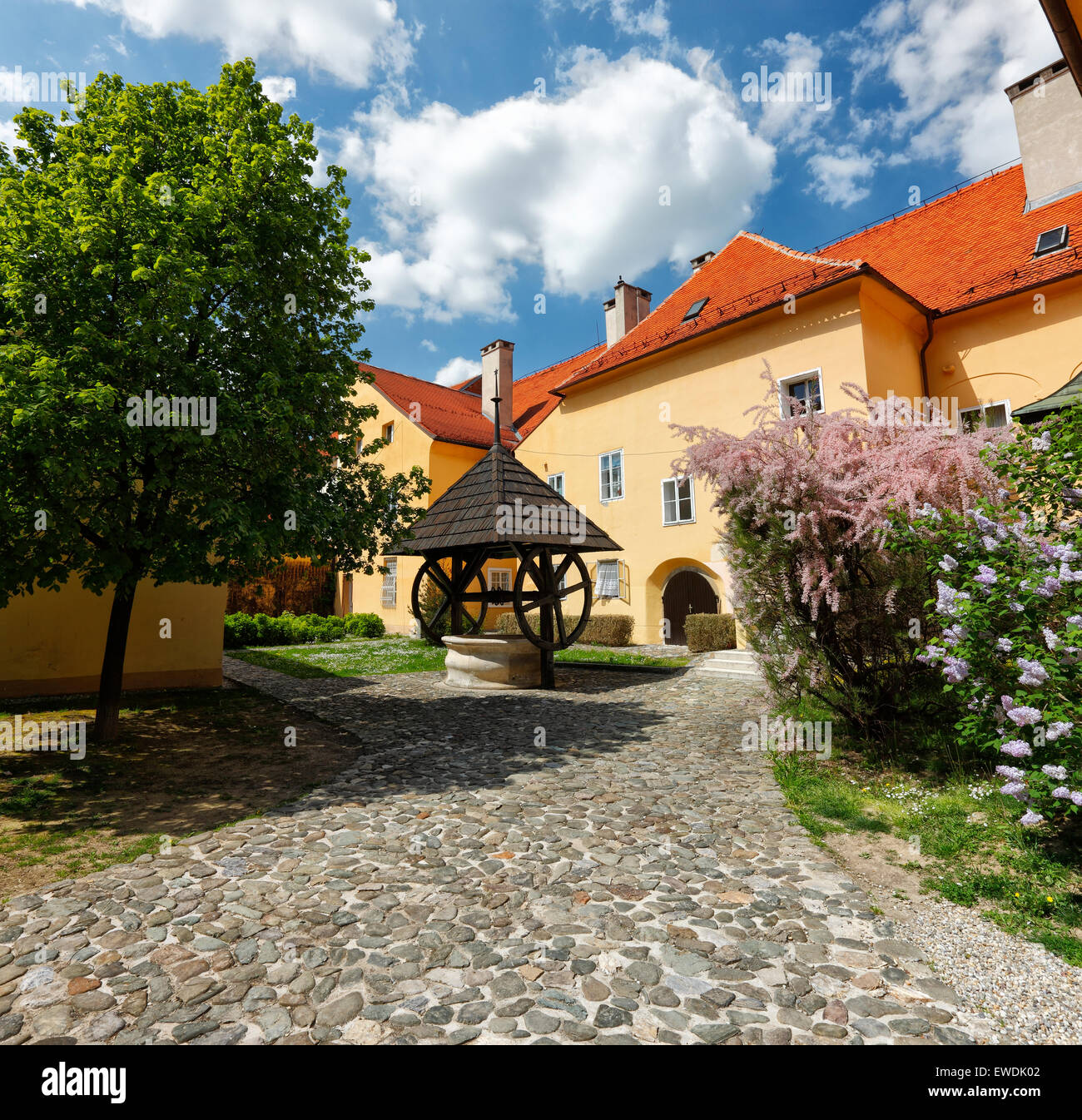 Zagreb old town, upper town. The old water well in courtyard. Stock Photo
