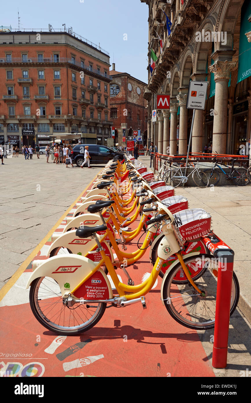 A Row of city bike for rent or Bike sharing station at The Duomo Piazza in Milan. symbol of mobility, ecology Stock Photo