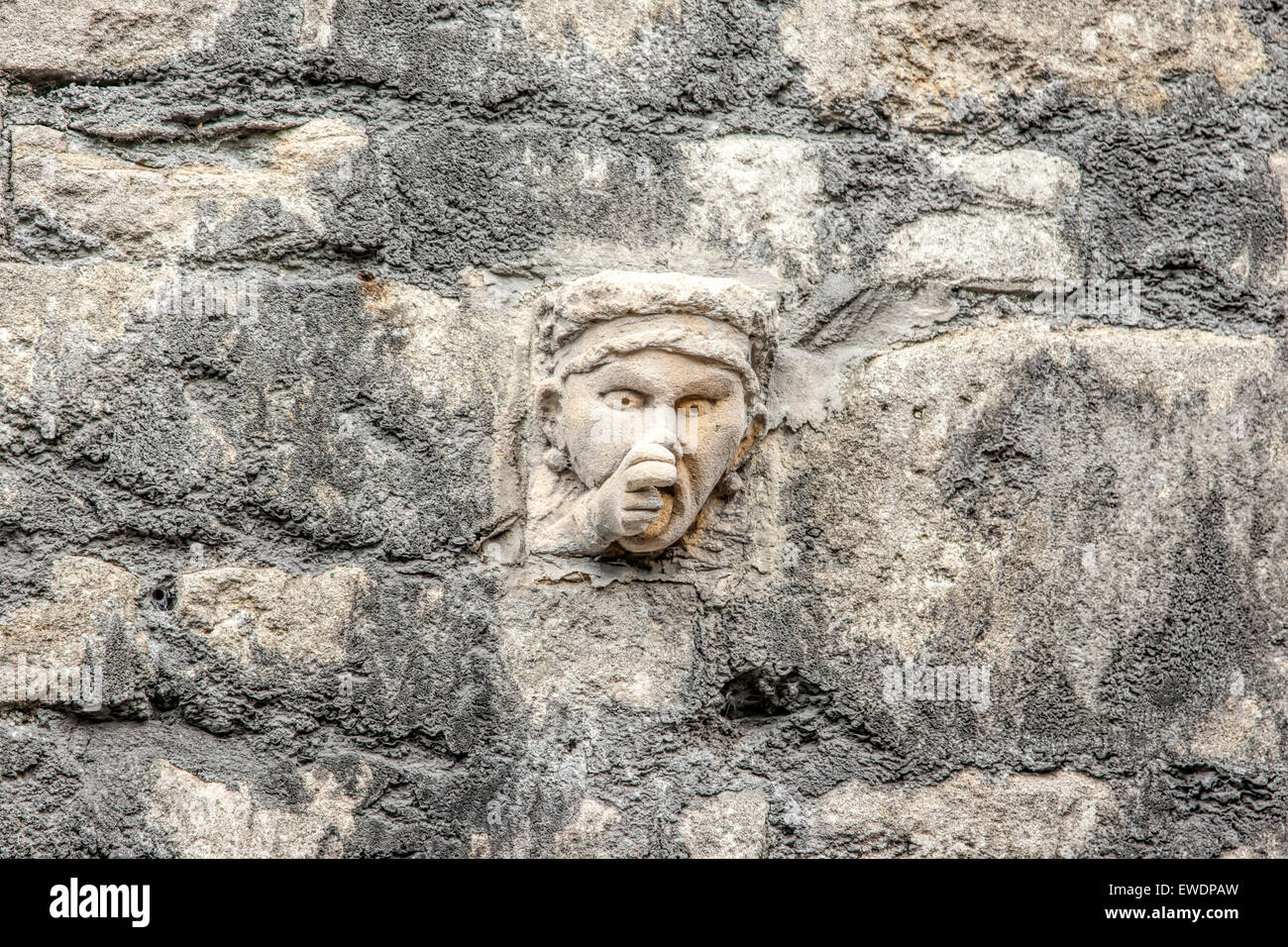 Carved stone head on wall hi-res stock photography and images - Alamy