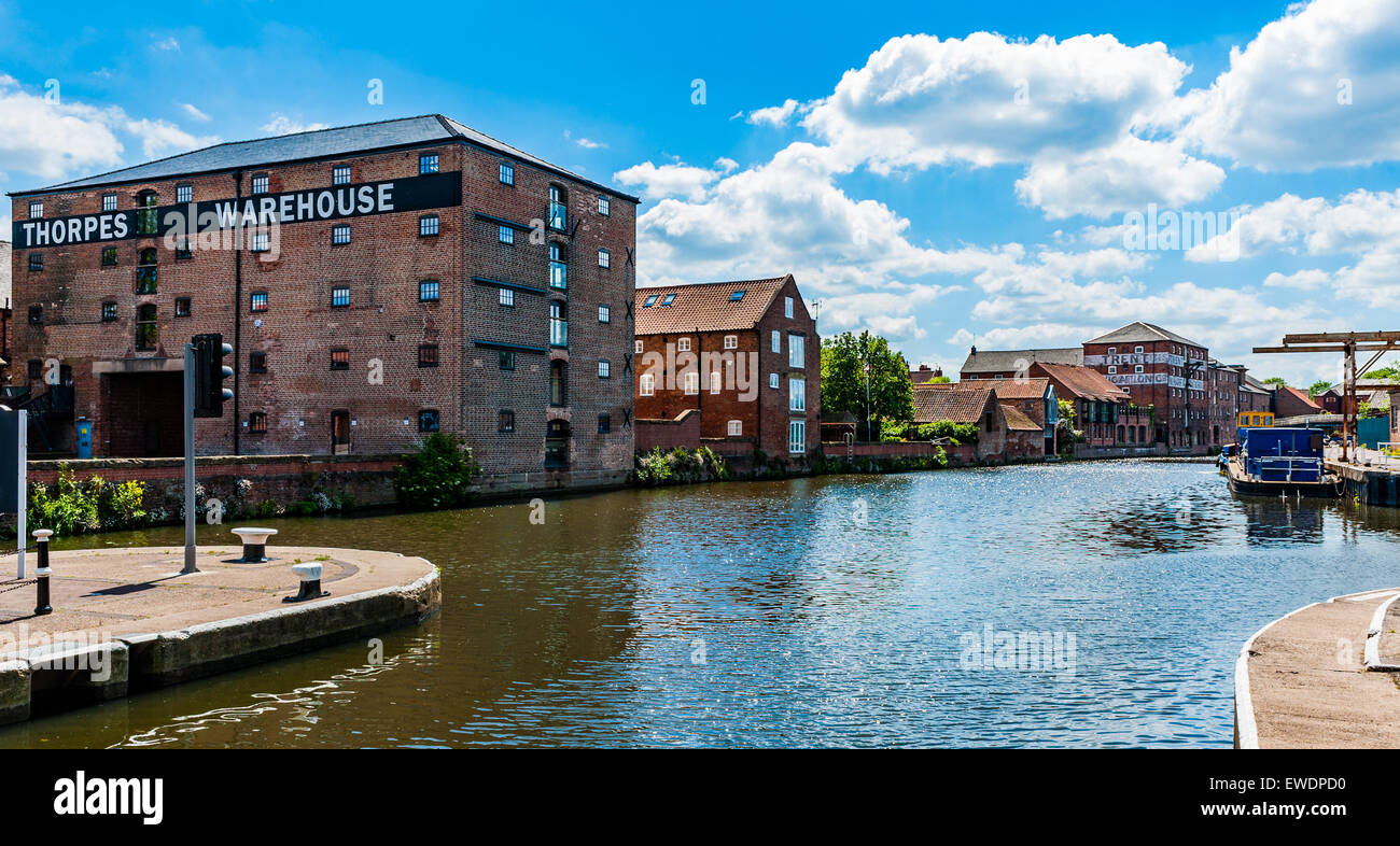 The River Trent; Newark-on-Trent, Nottinghamshire at Newark Town Lock - with old riverside warehousing and moorings Stock Photo