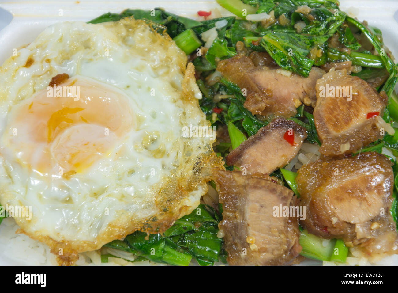 Crispy pork belly stirfried with green Kale Stock Photo Alamy