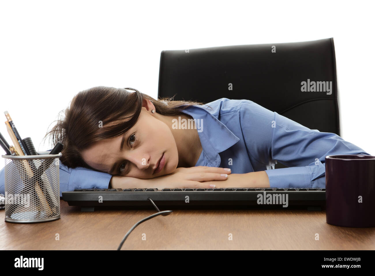business woman asleep on her desk at work Stock Photo - Alamy