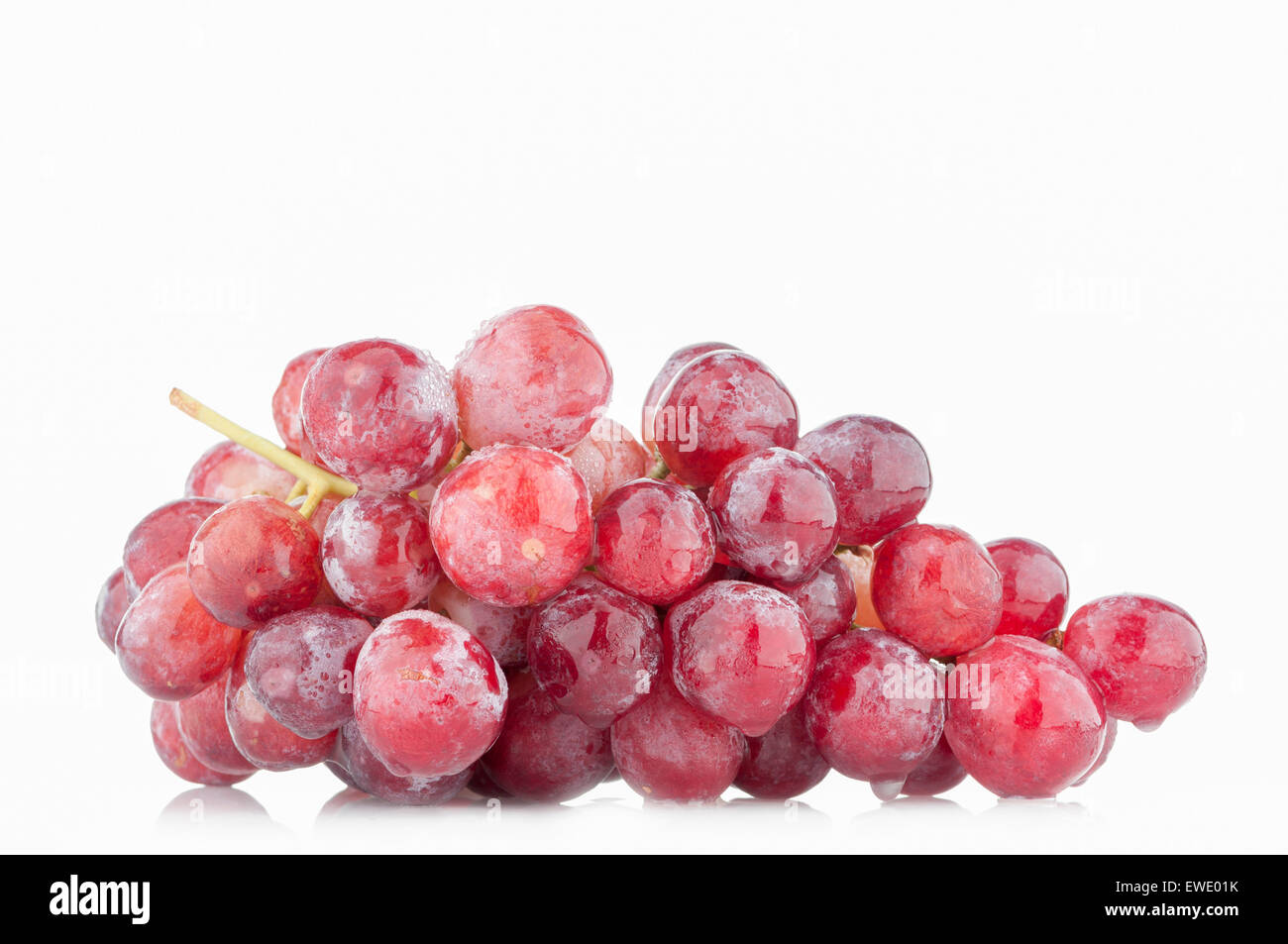 Isolated bunch red grapes on white background Stock Photo