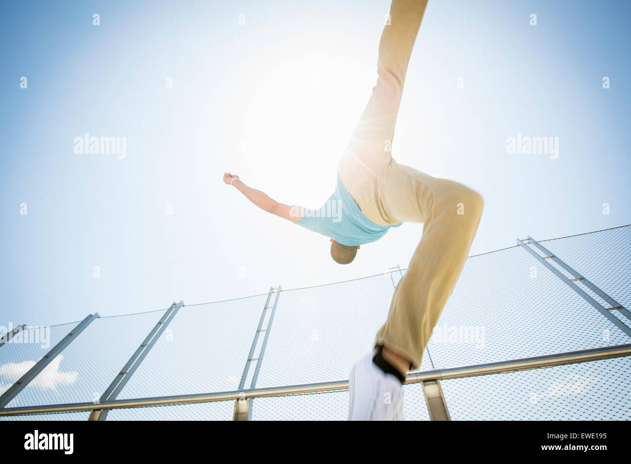 Young man somersaulting parcour parkour free running Stock Photo