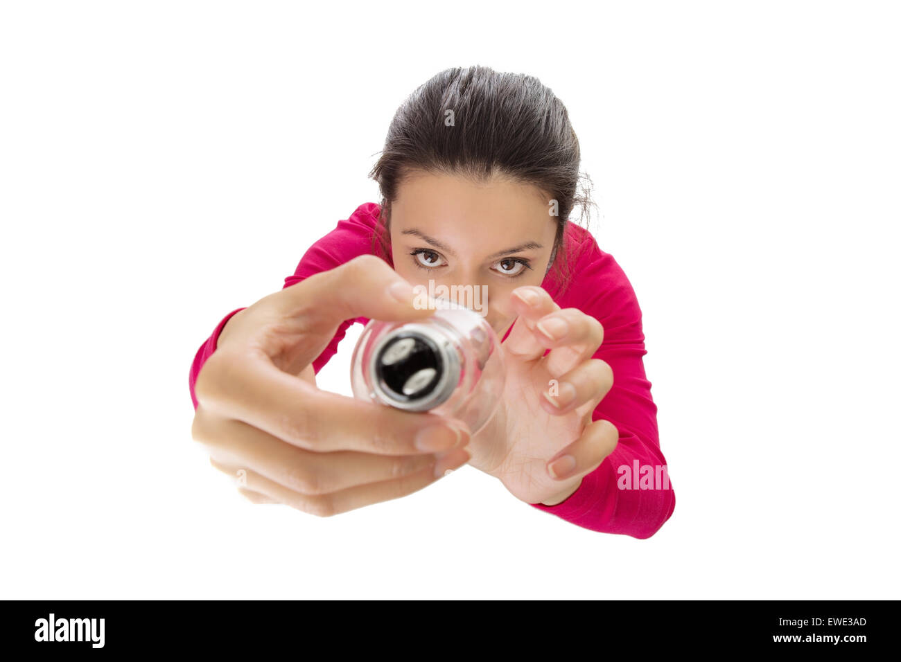 woman changing a light bulb shot from a birds eye view looking down Stock Photo