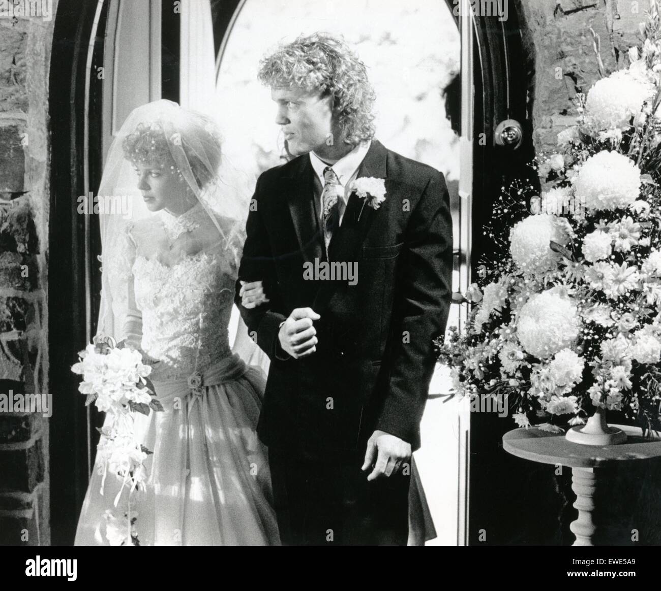 LIBRARY PIC. c.1988Kylie Minogue as Charlene and Craig McLachlan as