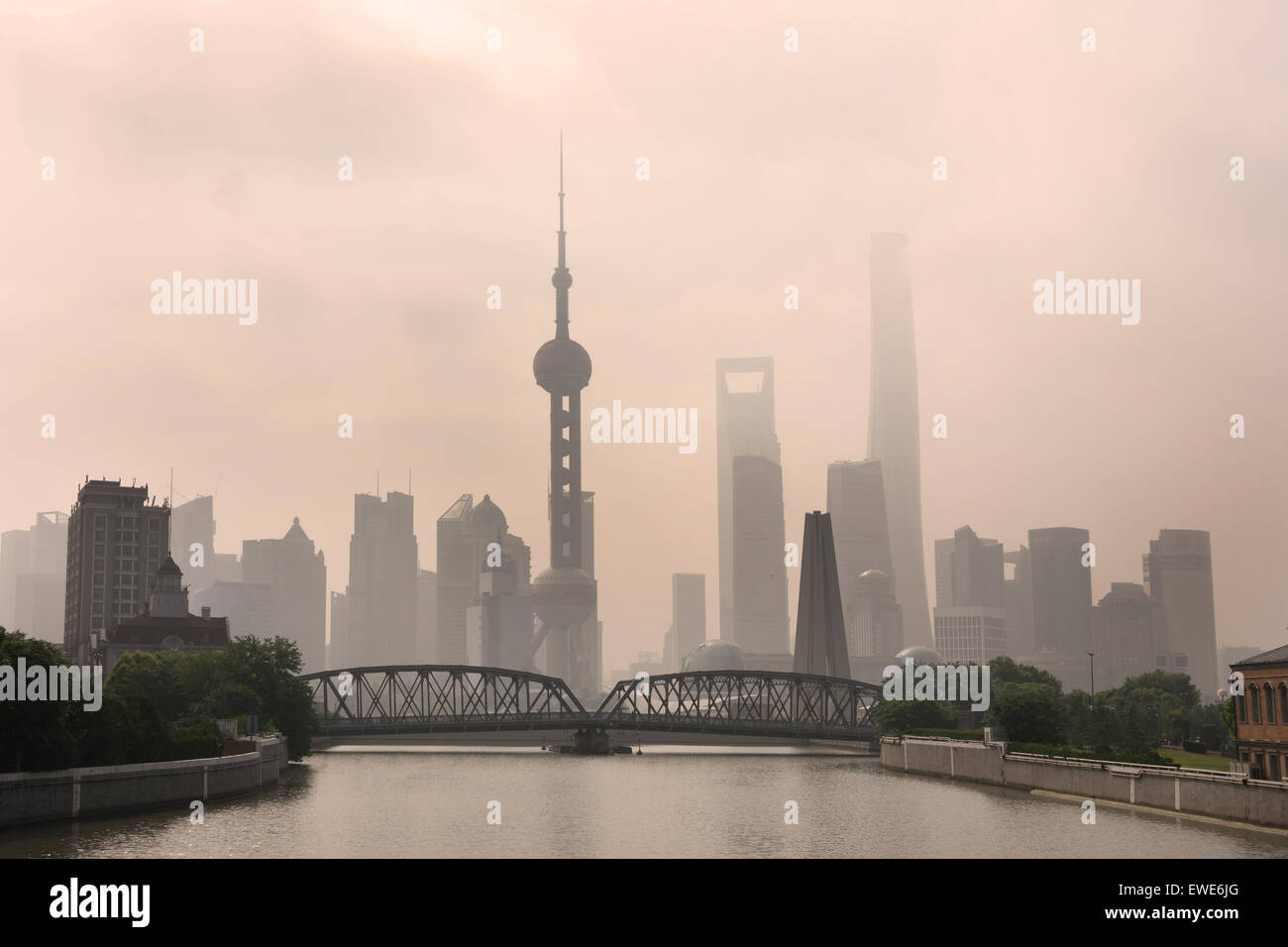 Shanghai Waibaidu Bridge with Pudong City on background  Skyline Oriental Pearl television tower, Jin Mao Tower, World Financial Center,  Huangpu River China ( Wusung River Suzzhou Creek ) Stock Photo