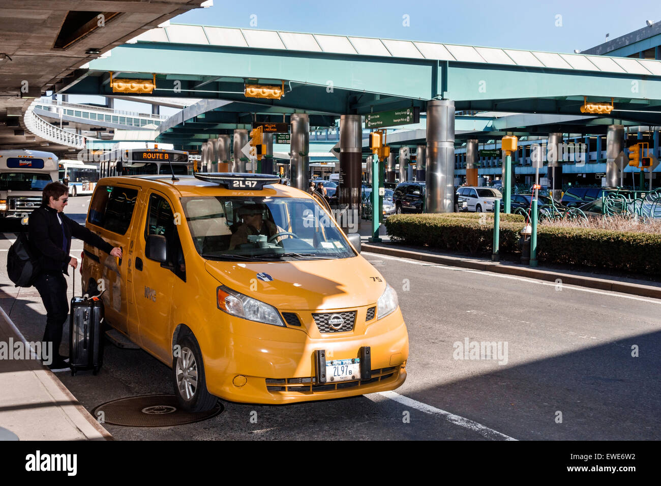 New York City,NY NYC,Queens,LaGuardia Airport,LGA,outside exterior,taxi,cab,picking up passenger