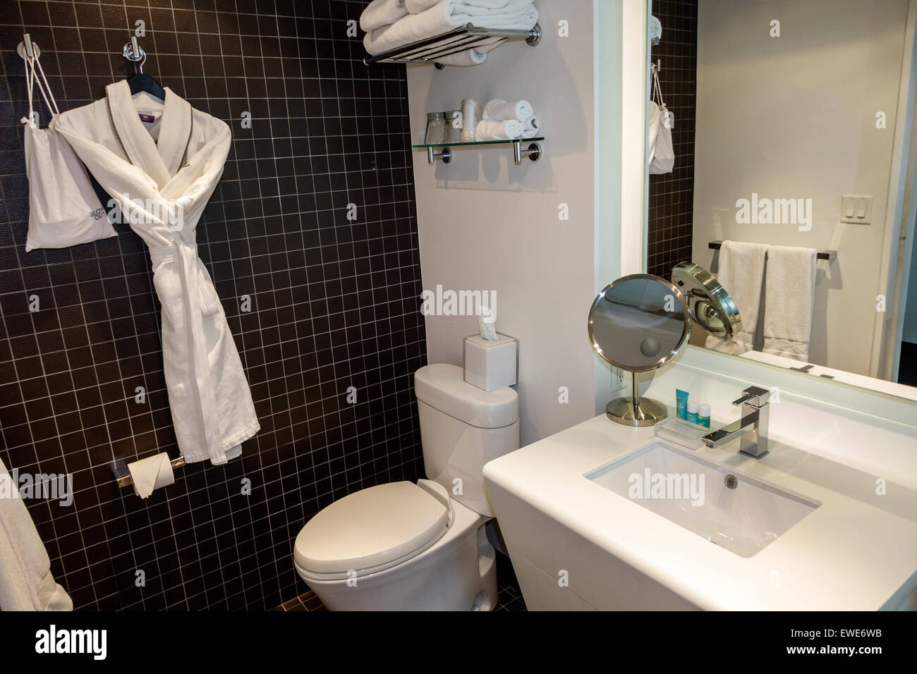 New York City,NY NYC,Manhattan,Lower,Financial District,W Downtown,hotel,interior inside,guest room,bathroom,robe,sink,toilet,white,NY150325020 Stock Photo