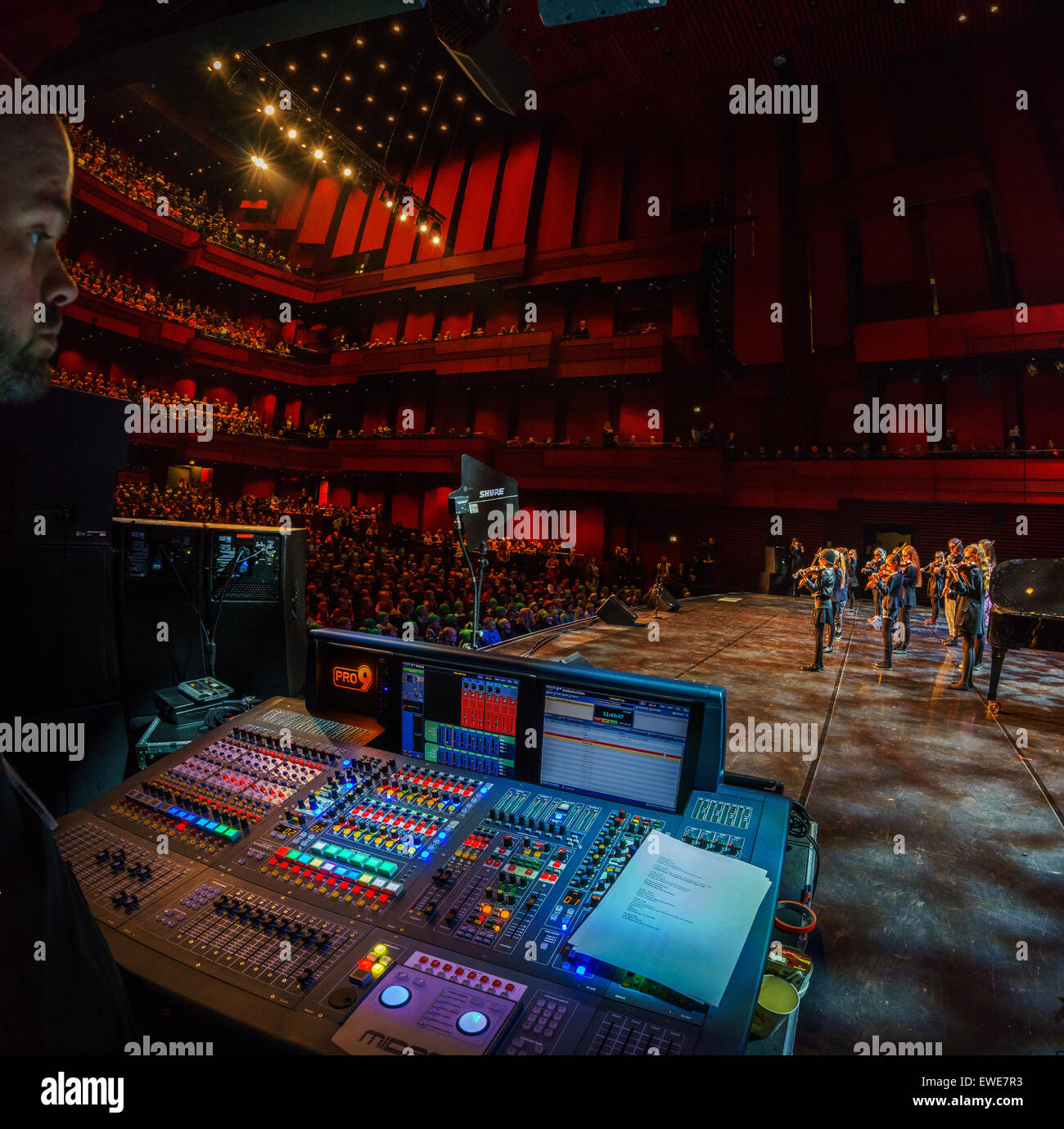 Sound mixing board used for musical performances. Young group performing, Harpa, Reykjavik, Iceland Stock Photo