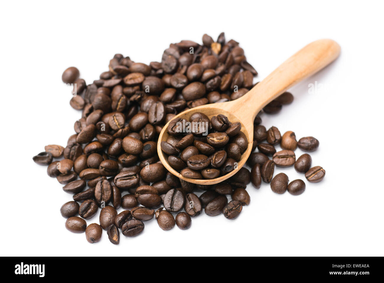 Coffee beans with wood spoon on white background Stock Photo - Alamy