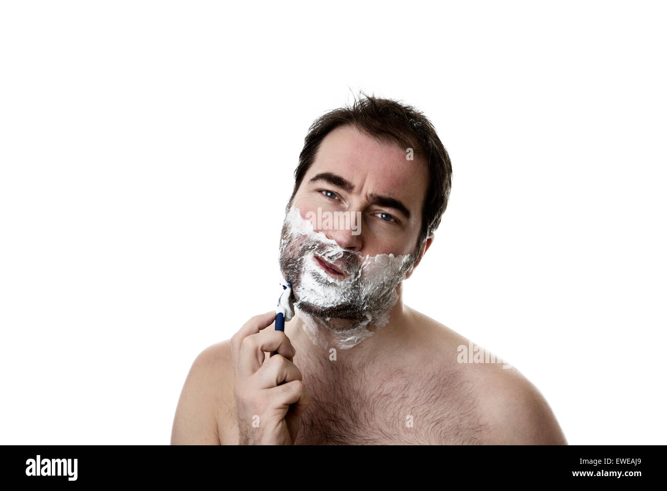 man shaving two week of facial hair growth of his face Stock Photo - Alamy