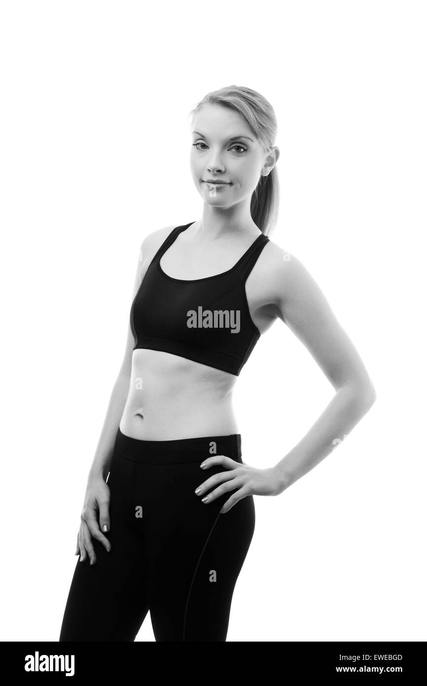 young fitness woman shot in the studio standing looking at camera Stock Photo