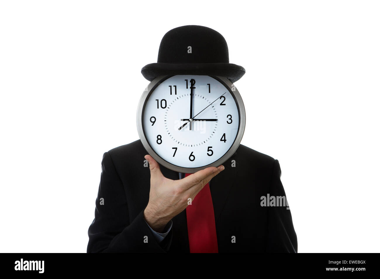 Businessman holding a clock up covering his face wearing a bowler hat