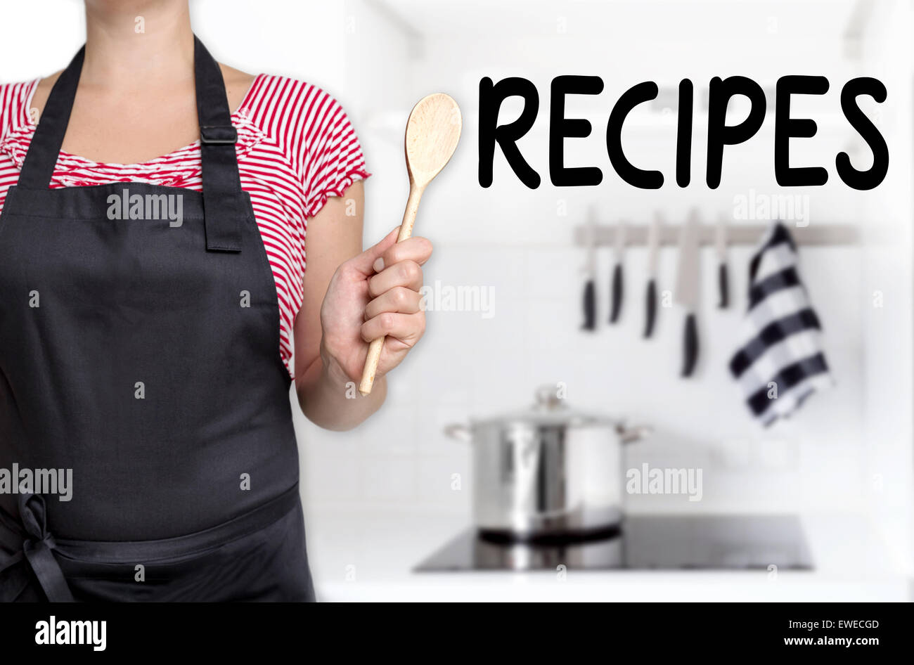 Recipes cook holding wooden spoon background. Stock Photo
