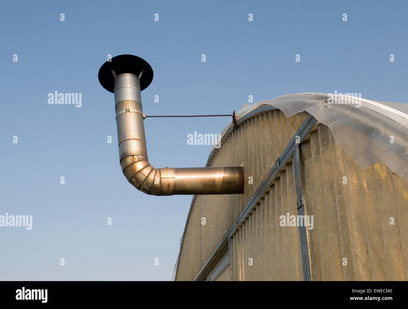 greenhouse heating system with chimney Stock Photo Alamy