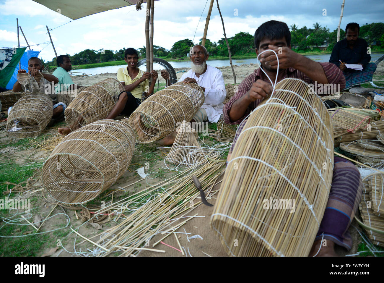 People making fishing box by bamboo sticks for sale at
