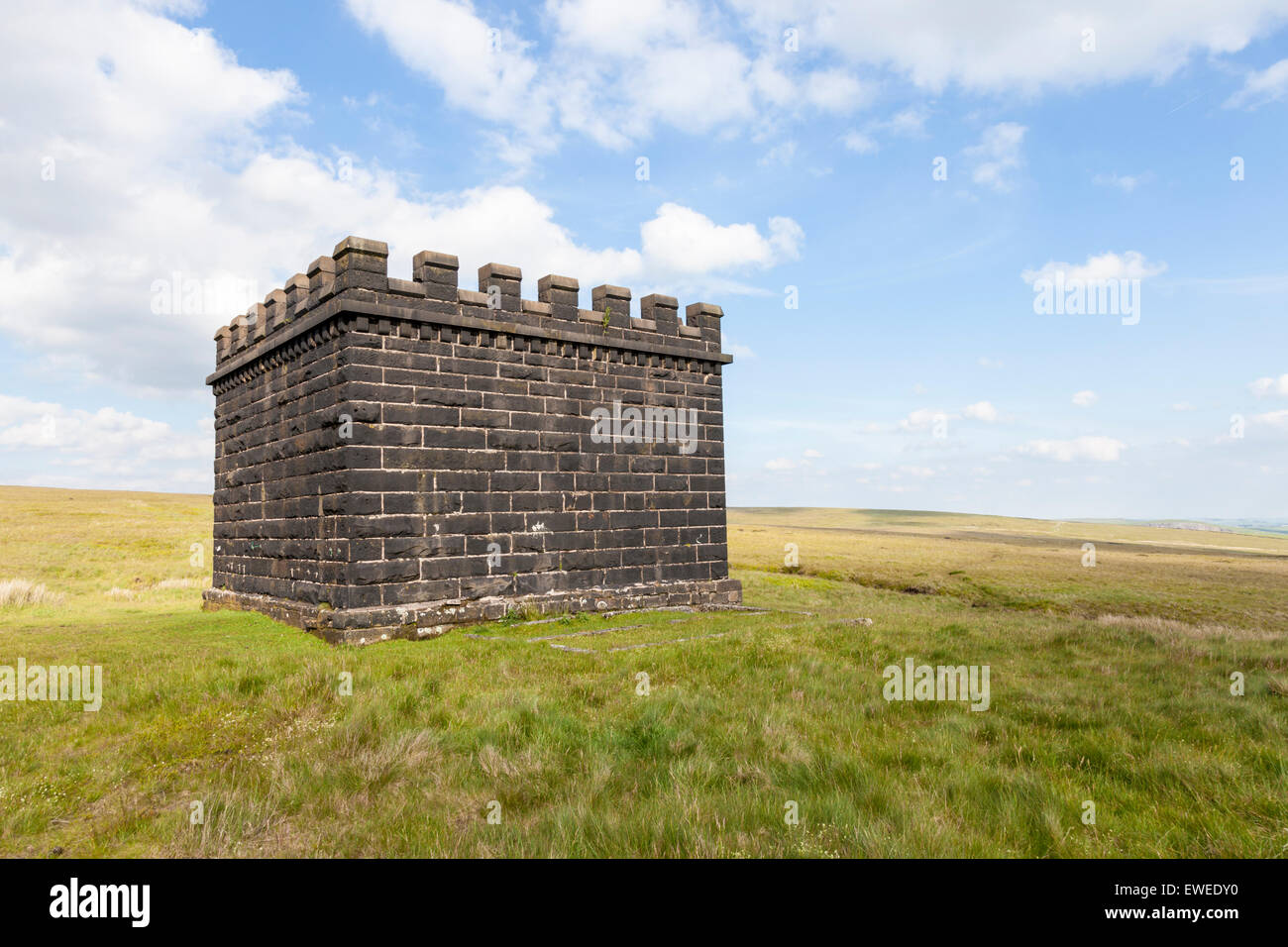 An air shaft with castellated walls giving ventilation to the railway line in Cowburn Tunnel, Derbyshire, Peak District, England, UK Stock Photo