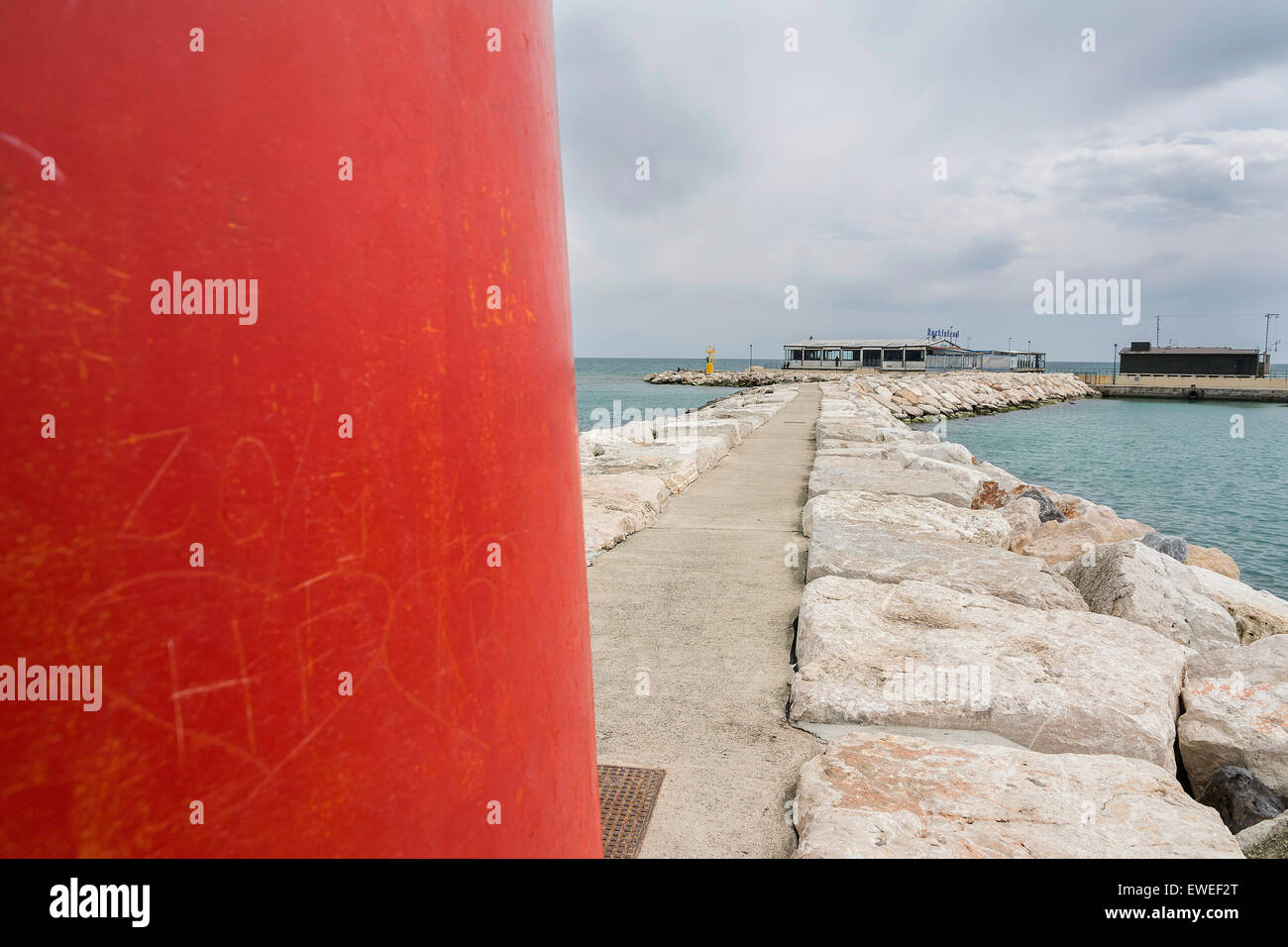 promises of love scratched on a red lighthouse Stock Photo