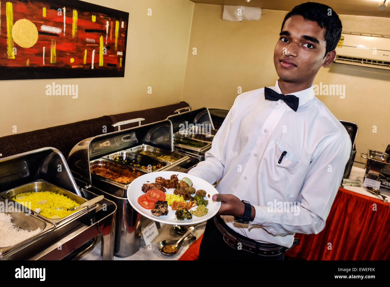 Mumbai India,Churchgate,Veer Nariman Road,Indian Summer,restaurant restaurants food dining cafe cafes,buffet style line,waiter waiters server employee Stock Photo