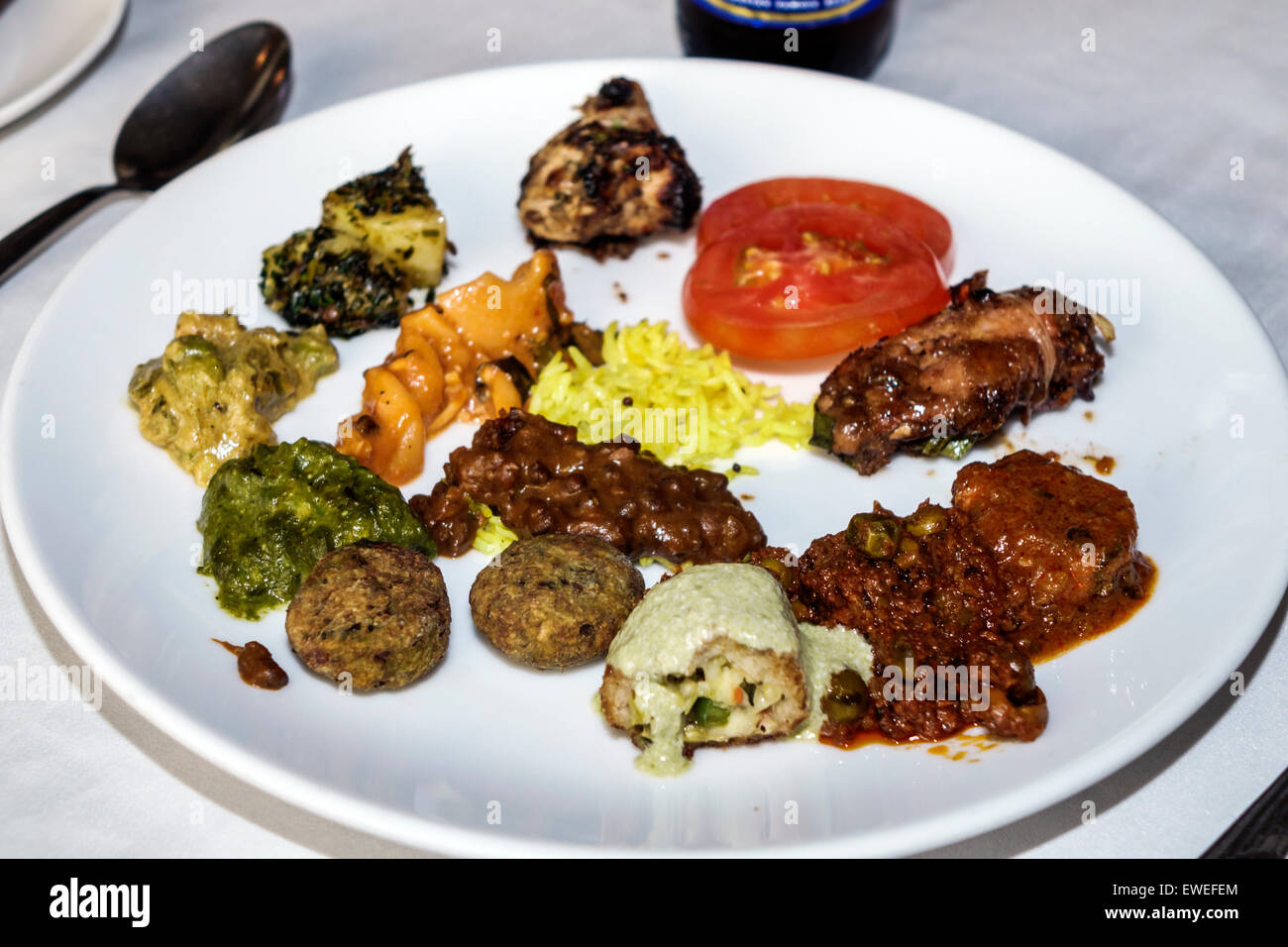 Mumbai India,Churchgate,Veer Nariman Road,Indian Summer,restaurant restaurants food dining cafe cafes,buffet style,plate,food,cuisine,spoon,fork,meat, Stock Photo
