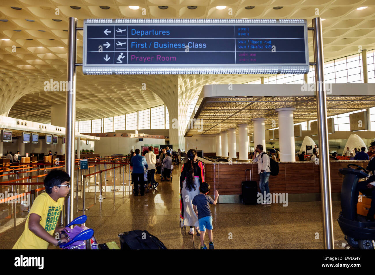 Mumbai India,Chhatrapati Shivaji International Airport,terminal,interior inside,sign,English Hindi,male boy boys kids children India150303087 Stock Photo
