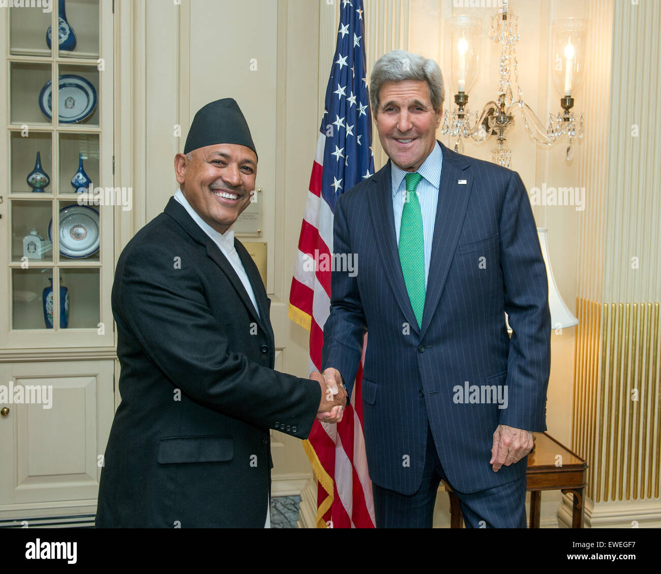 U.S. Secretary of State John Kerry poses for a photo with Nepalese Ambassador to the U.S. Arjun Kumar Karki at the U.S. Department of State in Washington, D.C., on May 11, 2015. Stock Photo