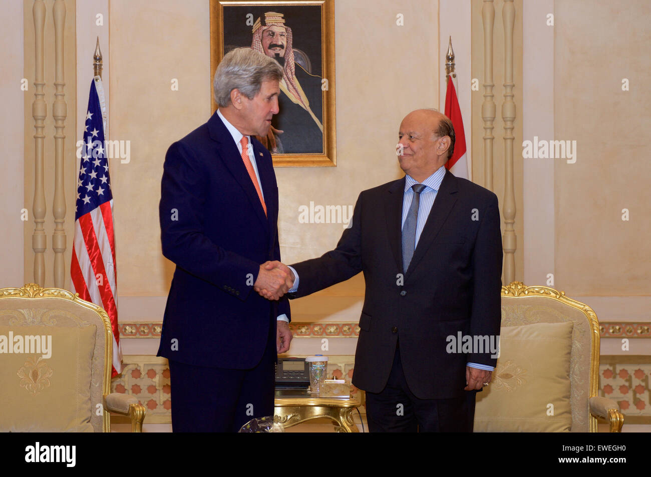 U.S. Secretary of State John Kerry shakes hands with Yemeni President Abd Rabbuh Mansur Hadi before the two held a bilateral meeting in Riyadh, Saudi Arabia, on May 7, 2015. Stock Photo