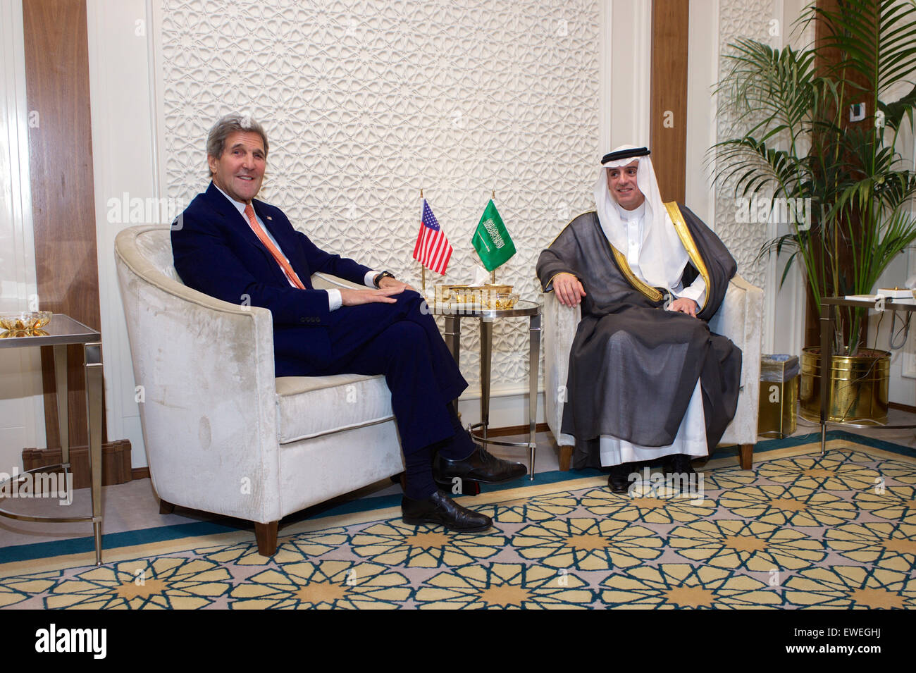 U.S. Secretary of State John Kerry sits with newly appointed Saudi Foreign Minister Adel al-Jubeir - who welcomed him as his first visitor in his new office - before a bilateral meeting on May 7, 2015, at the Saudi Ministry of Foreign Affairs in Riyadh, Saudi Arabia. Stock Photo