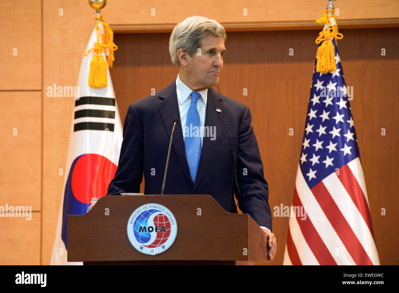 U.S. Secretary of State John Kerry listens as Republic of Korea Foreign Minister Yun Byung-se addresses a news conference after the two held a bilateral meeting on May 18, 2015, at the Ministry of Foreign Affairs in Seoul, South Korea. Stock Photo