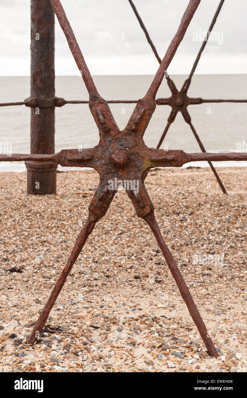Rusting steel star brace on Dovercourt lighthouse keeping tension and metal legs in place from splaying out Stock Photo