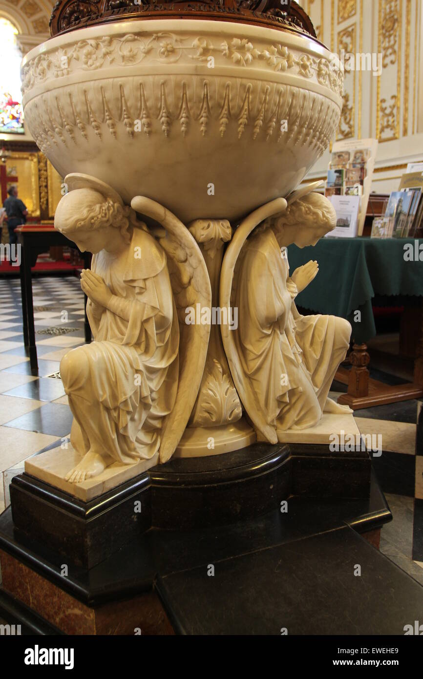 Picturesque Statues of Praying Angels  in the church interior of Witley Church Worcestershire England Stock Photo