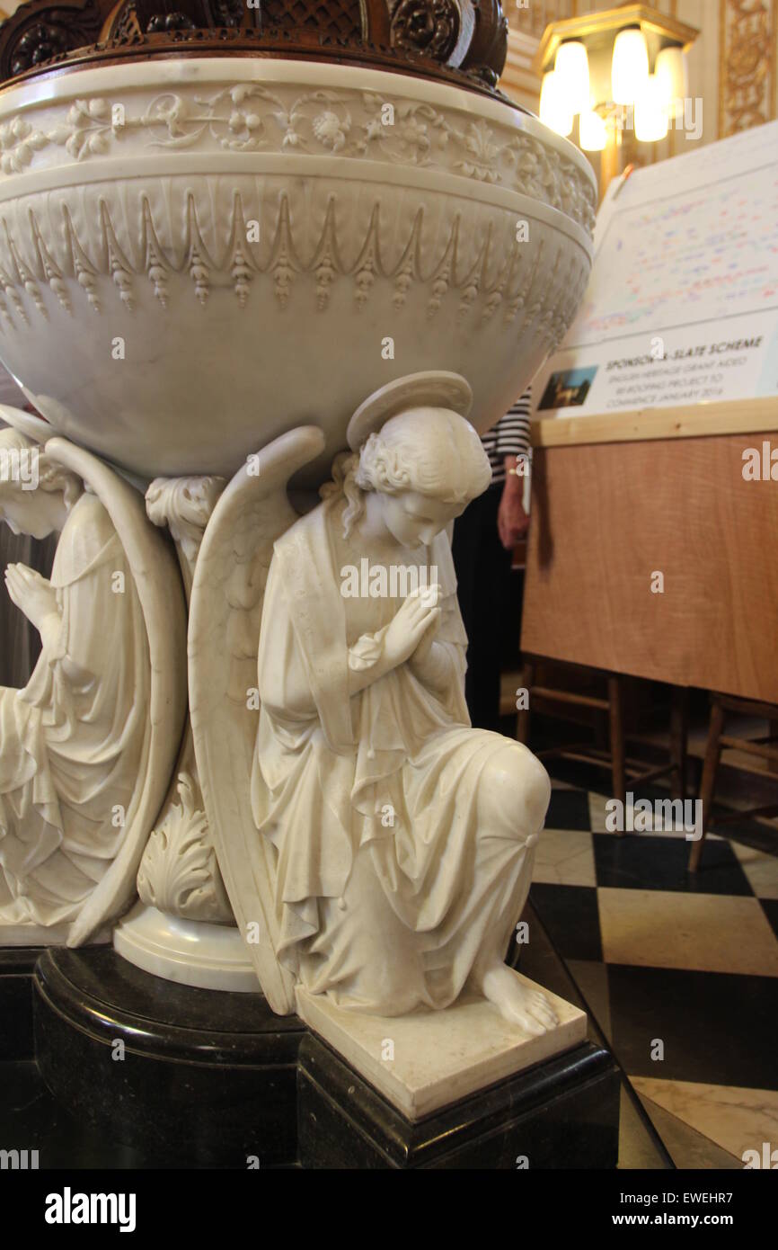 Picturesque Statues of Praying Angels  in the church interior of Witley Church Worcestershire England Stock Photo