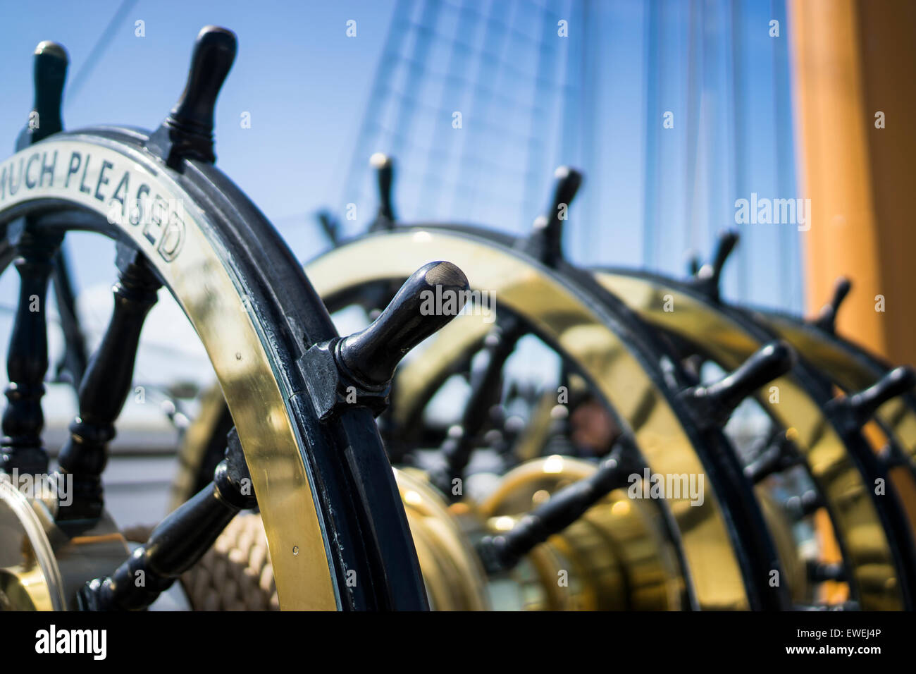 A brass steering wheel of a ship at Portsmouth. Stock Photo
