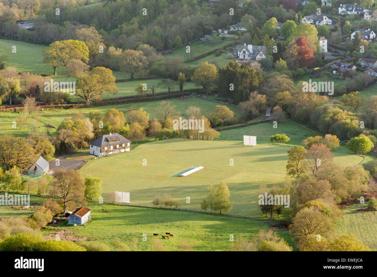 The early morning sun splashes Chagford cricket ground with some warm light. Stock Photo