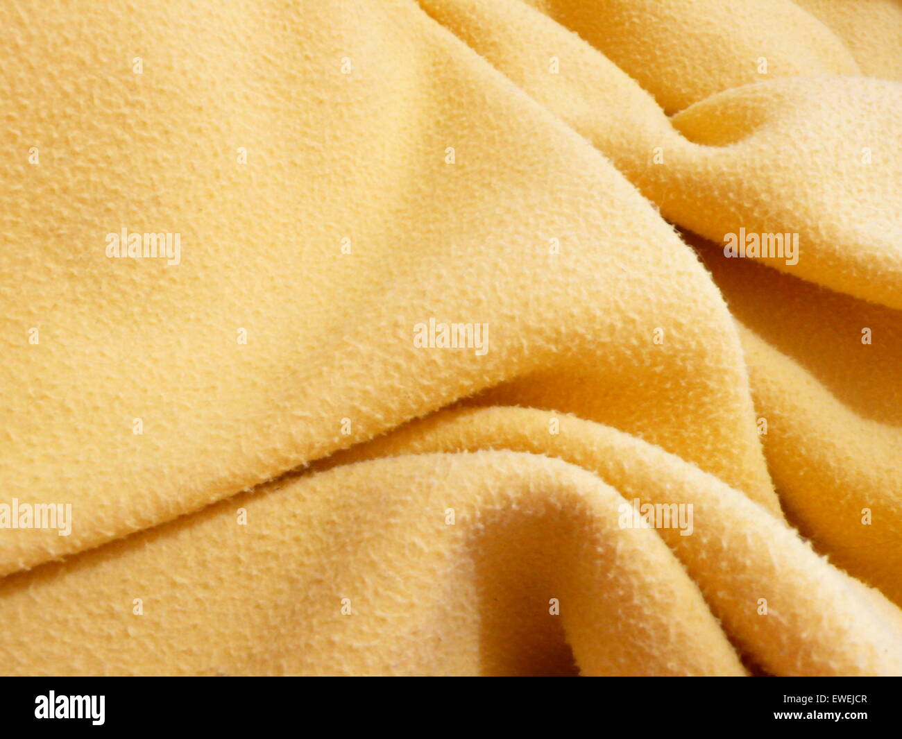 yellow polar fleece, in interior Stock Photo Alamy