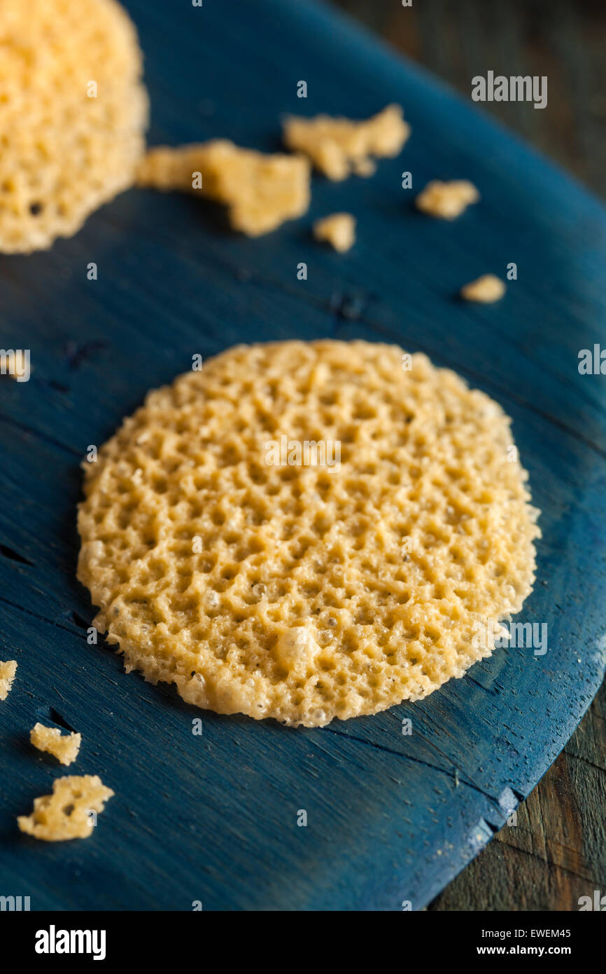 Homemade Parmesan Cheese Crisps on a Cutting Board Stock Photo Alamy