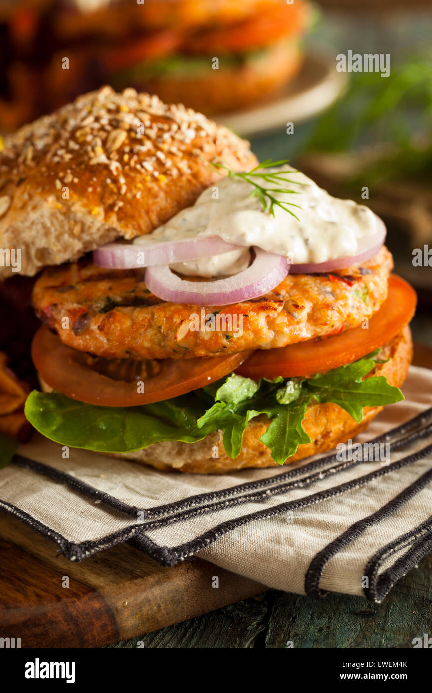Homemade Organic Salmon Burger with Tartar Sauce Stock Photo Alamy