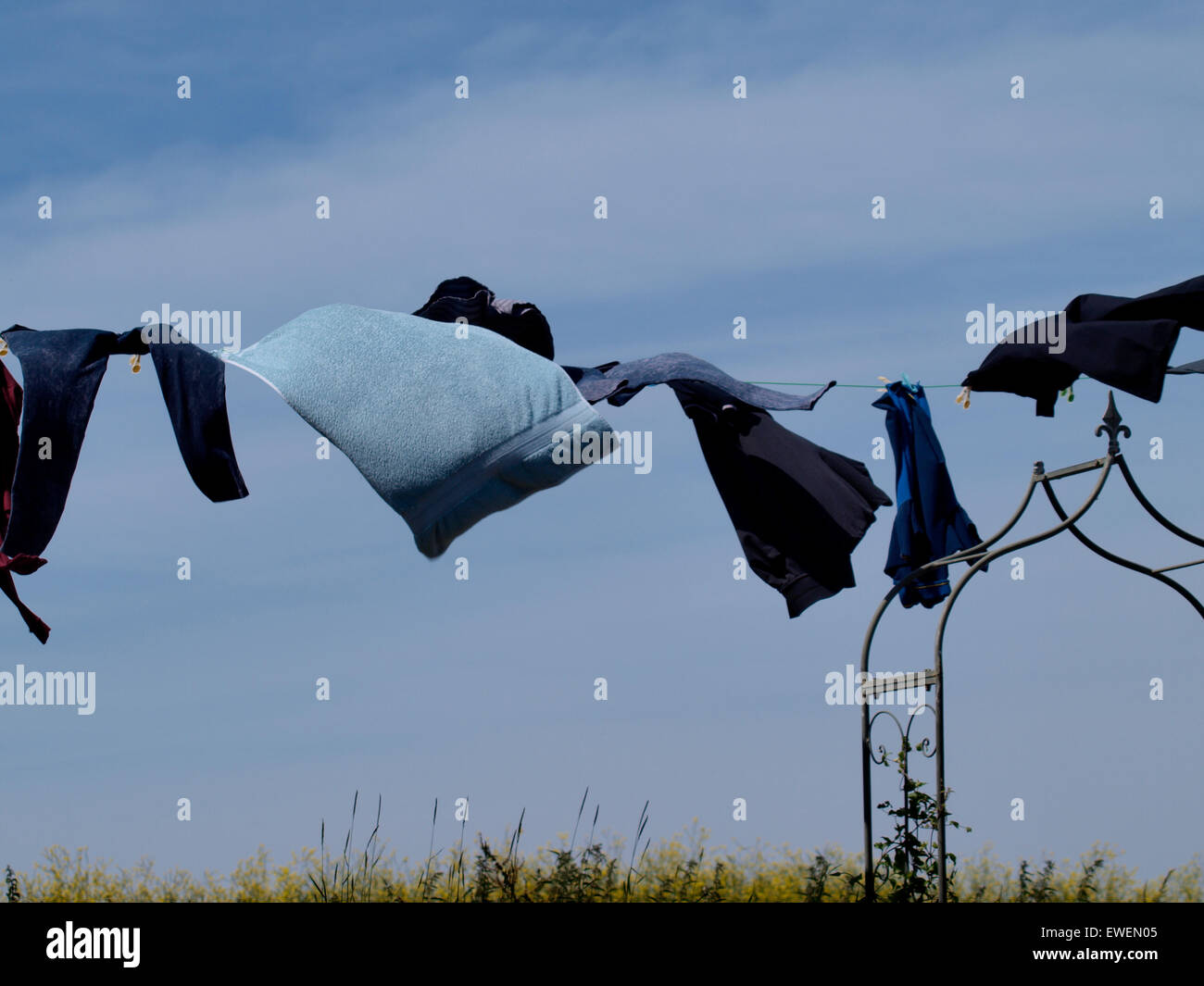 Washing on a line blowing in the wind, Somerset, UK Stock Photo
