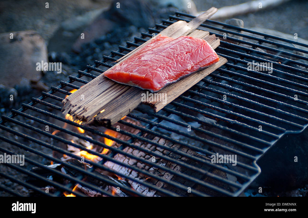 Smoked salmon on the grill at Strathcona Park Lodge in Strathcona Provincial Park, Vancouver Island, British Columbia, Canada. Stock Photo